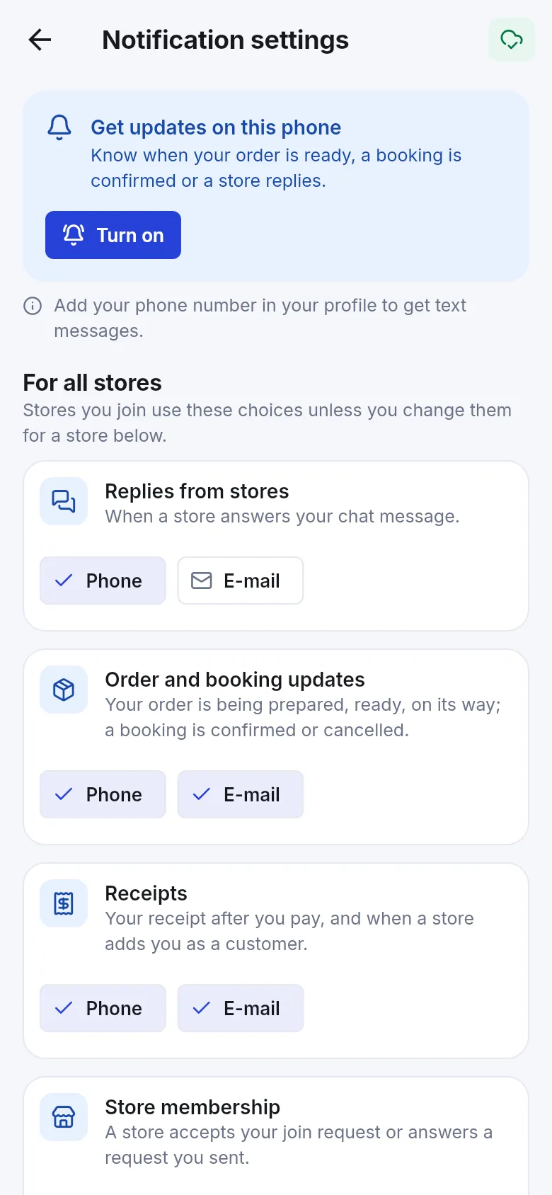 Notification settings with the Get updates on this phone card and a Turn on button above the choices for all stores